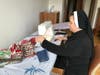 Sr. Teodora turns fabric into masks.