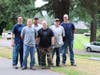 Puyallup City Government Employees and South Hill Stake Latter-day Saints work together to honor the National Day of Service by helping to maintain and preserve the grounds of Woodbine Cemetery  