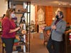 Village President Kathryn Ciesla (l) speaks with Rabi Akbik, Akbik Furniture + Design at Northbrook Court.