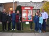 Nathan Metzl, third from left, was joined by his parents, grandparents and brothers at the ribbon cutting for the Legacy Pantry.