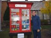 Nathan Metzl with the Legacy Pantry, stocked with food staples.