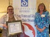 Alexis Wallace accepted the Community Partner of the Year Award on behalf of Penn Community Bank Foundation from SIIR Club President Kathy Waddington.