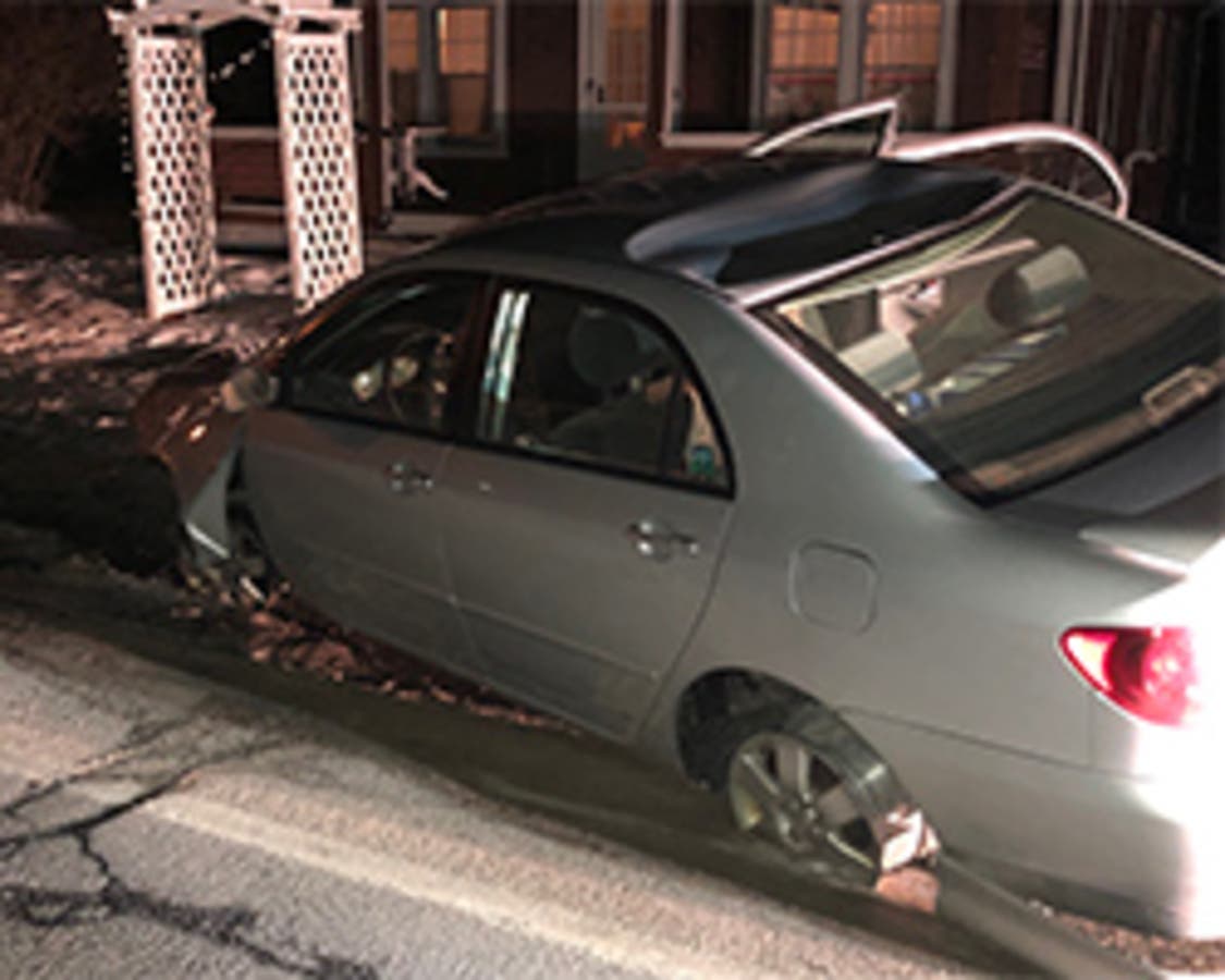 Police say driver of this car was fleeing from scene of Concord accident with two missing wheels and no front bumper.