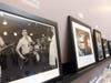 Framed shots from Boston music photographer J.J. Gomson line the walls of Village Vinyl & Hi-Fit in Brookline.