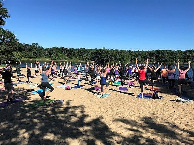 Free adult yoga at Wright's Pond is one of the many summer programs the Medford Recreation Department is offering.