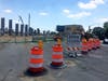 Ball Square business owners remind customers that restaurants, stores are open during Broadway bridge construction.