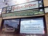 Ball Square business owners remind customers that restaurants, stores are open during Broadway bridge construction.