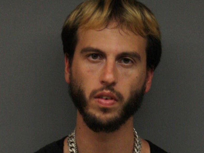 A Coventry man was charged with sexual assault Thursday after a woman accused him of grabbing her breast on a Coventry Greenway bike path.