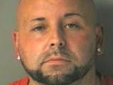Merrimack Police said Paul Wheeler, 38, refused to allow his male victim to leave The Residences on Daniel Webster Highway on Monday.