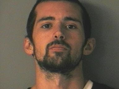 Merrimack Police said Joshua Rochette failed to surrender guns that he said he owned when a protective order was issued against him.