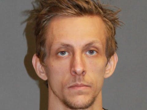 Nashua Police said Michael Moore Jr was identified as a suspect during the investigation of a robbery at Racing Mart on Canal Street.