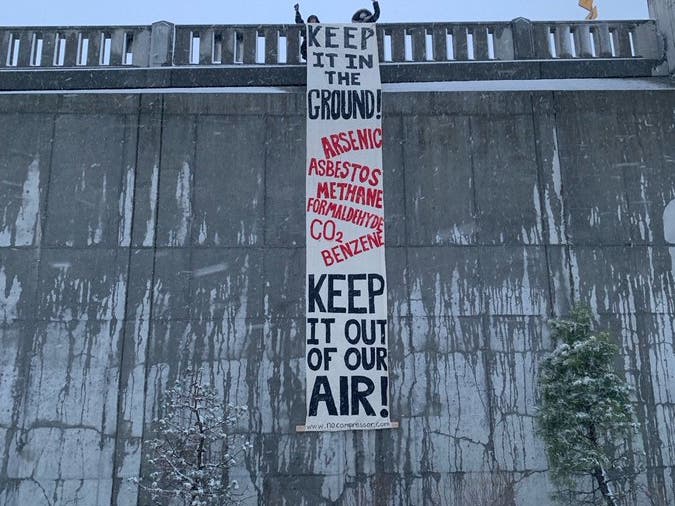 The group Fore River Residents Against the Compressor Station said six protesters were arrested for blocking entrance to the station.