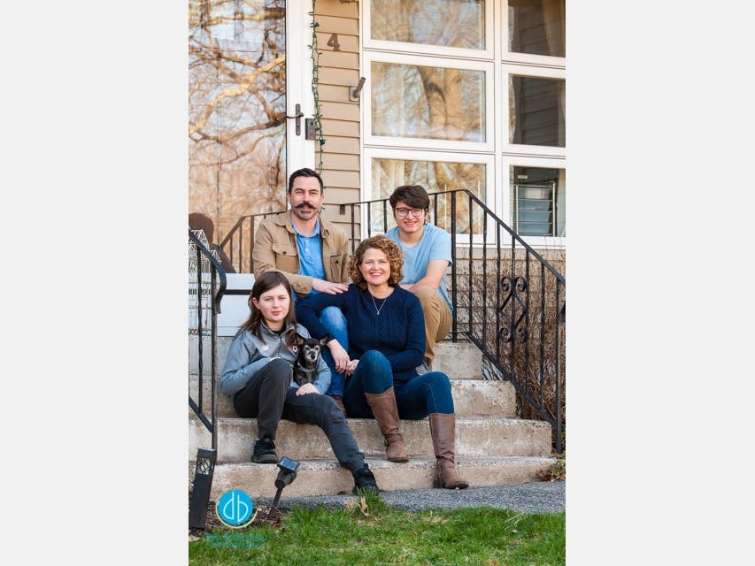 Matt and Annie Slobogan of North Attleboro, Owners of The Preservation Framer posed for one of Debbie Bettencourt's Front Porch Photos.