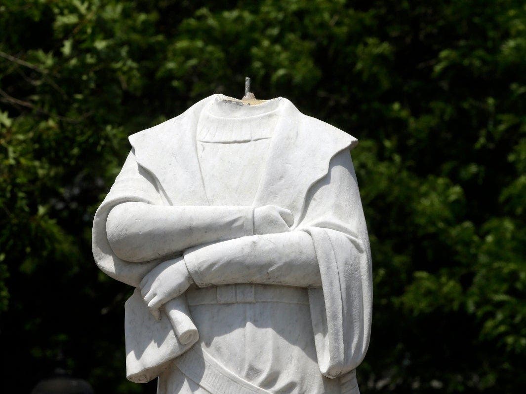 Christopher Columbus lost his head at a North End statue (above.) Now he lost his day at Melrose Public Schools. 