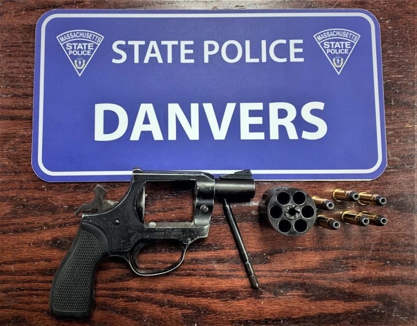 Two men are facing gun charges after a Massachusetts State Police stop in Peabody on Sunday.