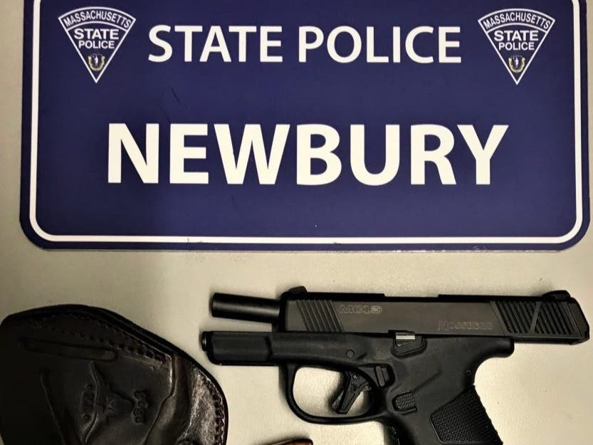 State Police troopers said a Peabody man is facing gun charges after a stolen pistol was found during a highway stop in Salisbury.