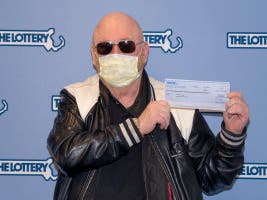 George Guinane won a $1 million prize in "The Fastest Road to $1 Million" instant ticket game with a ticket purchased at Village Food Store of Danvers.