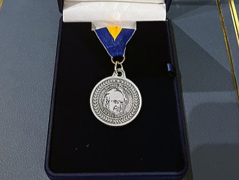 Net income from Dr. Rappaport's estate donation will pay for the 14-karat gold George Peabody Medals that are awarded each year to the top six students in the graduating class of Peabody High School.