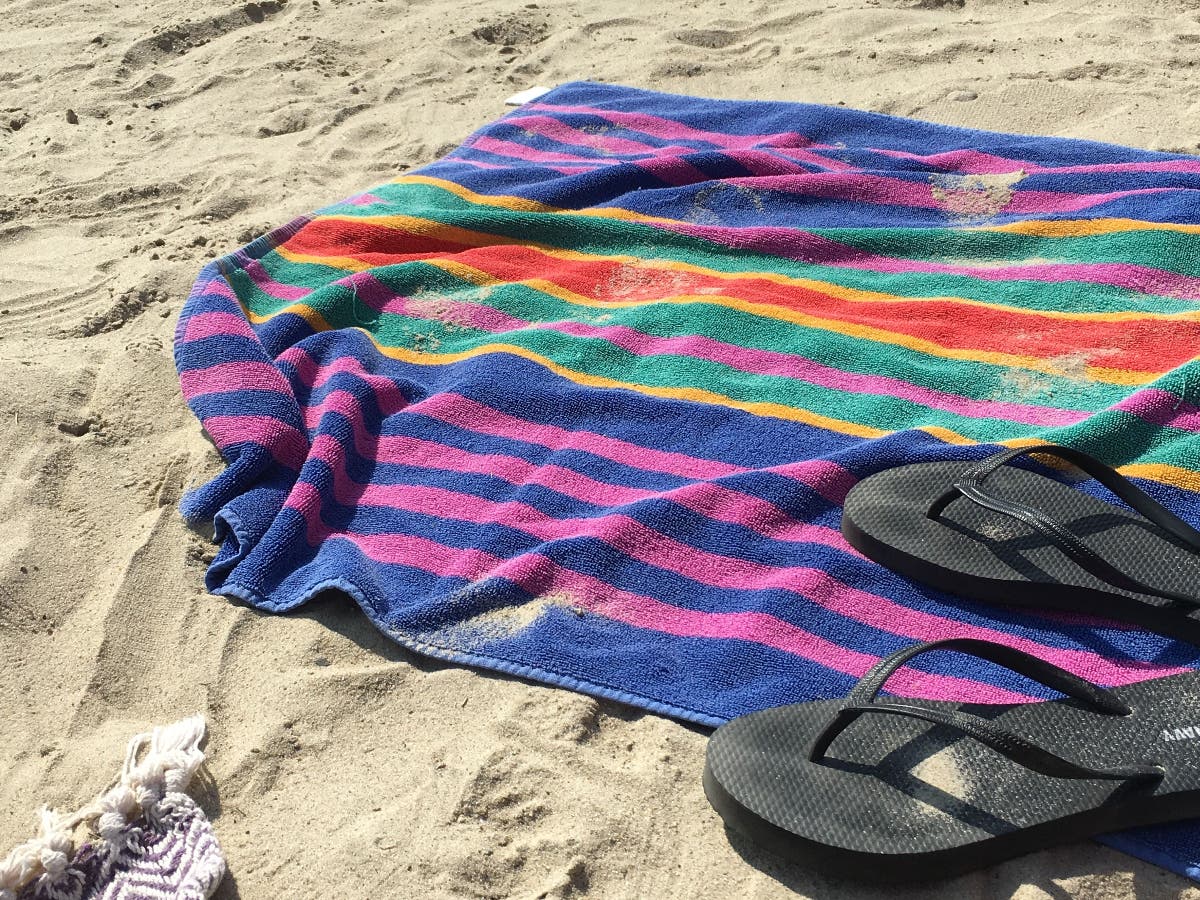 Marblehead's Gas House Beach reopened on Wednesday after being closed to swimming for five days because of high bacteria levels.