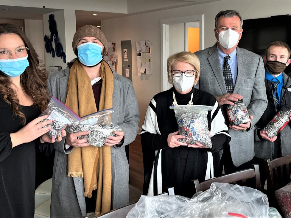 Rep. Thomas P. Walsh (D-Peabody) joined the leadership team at the Ronald McDonald House Charities New England (RMHC-NE) Boston Harbor location in Charlestown to contribute more than 40,000 can tabs.