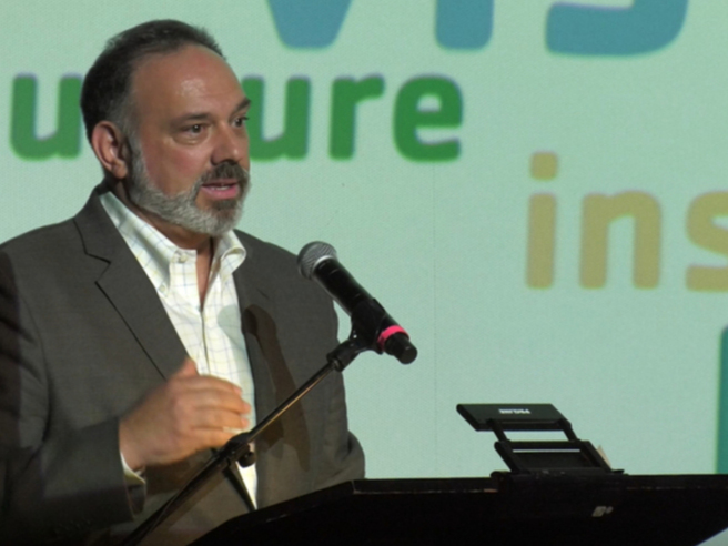 YMCA of the North Shore President and CEO Chris Lovasco addresses staff, supporters and community leaders at the annual Friends of the YMCA meeting at Beverly's Cabot Theater earlier this month.