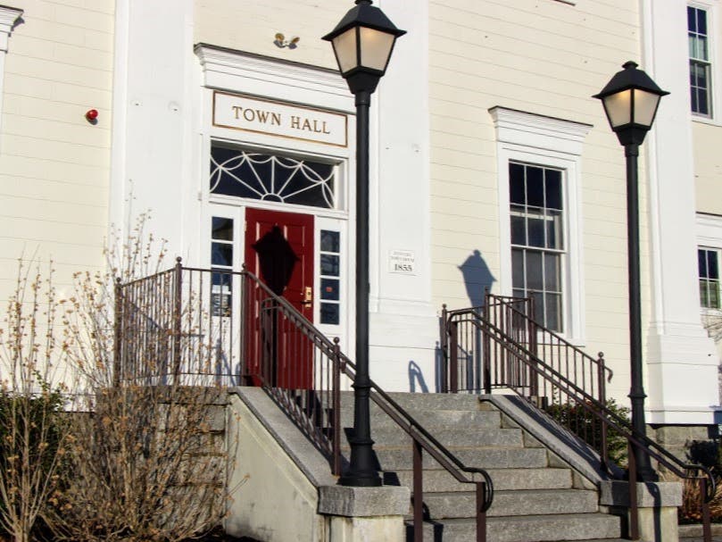 Town Counsel David DeLuca told reconvening town meeting members that decisions made at the Feb. 5 meeting could not take place until five days after the official dissolving of the meeting.