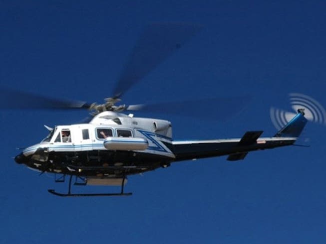 The aircraft is a NNSA twin-engine Bell 412 helicopter equipped with radiation-sensing technology.