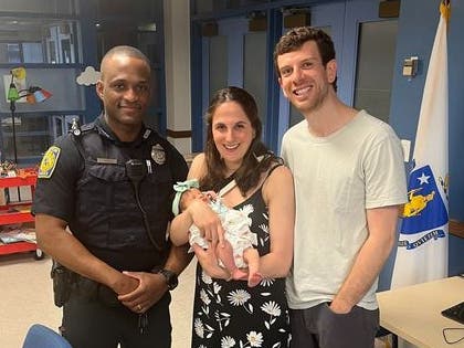 Police reported that Baby Naomi was doing great and that she and her parents stopped by the station to thank Officer Gilbert in person.