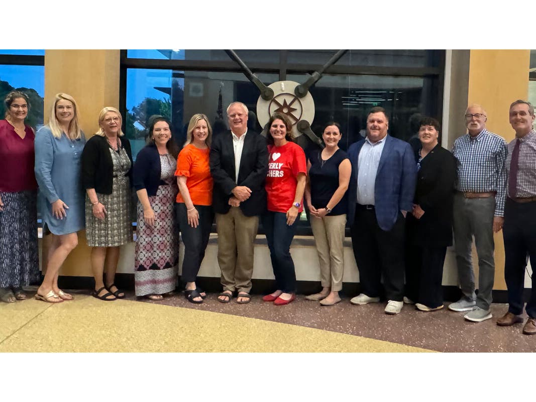School Committee President Rachael Abell, Kate Twombly, Superintendent Sue Charochak, Natalie Pommersheim, Catherine Barrett; Doug Walker, Ann Gavin; Sarah Aiello, Michael Osborne, Lorinda Visnick, Andy Cooper and Beverly Mayor Michael Cahill.