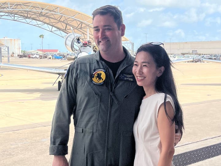 Commander James P. Morrison poses with his wife, Akemi, following the VT-28 Change of Command ceremony.