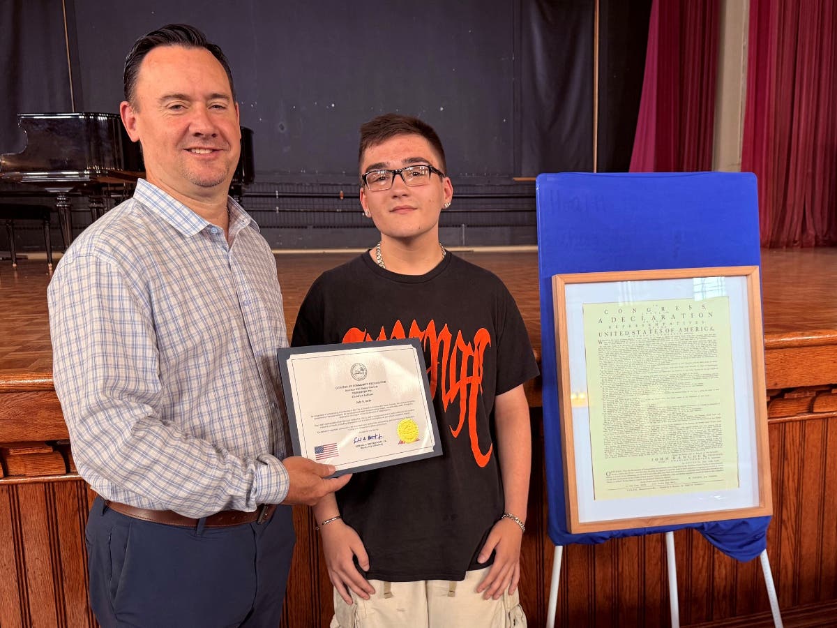 First‑place winner Christian LeBlanc receiving his citation and award from Mayor Ted Bettencourt.