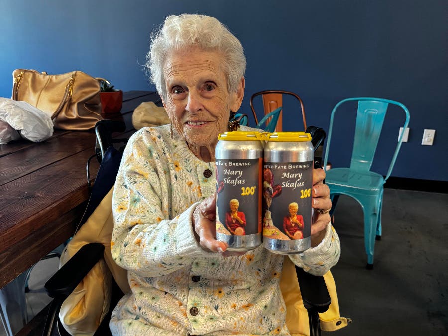 The beer's label includes a photo of Mary Skafas celebrating her 96th birthday in the Danvers taproom four years ago.