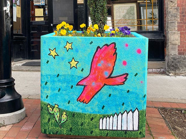 The Foster Street TDI District is inviting artists to apply to transform five metal planters into original works of public art as part of the area’s initial three-year revitalization effort.