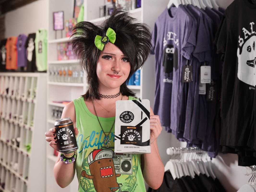 Salem teen small business owner Georgia Wrenn shows off her art for Witch City Blend inside her own Little Salem Shop at 12 Front Street in Downtown Salem.