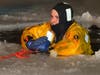 Woodbury Firefighter Zach Sweet in cold water rescue drill from slushy icy Nonnewaug River Feb 17th, 2026.