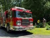 Woodbury's Engine 8 carried the department's Chief Engineer Don Harris and Firefighter Roger Sicard as they cleared brush from the town's 32 hydrants, inspected them, and lubricated the pipe threads.