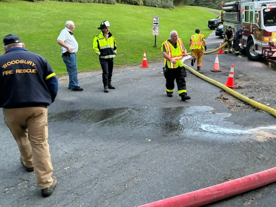 Woodbury Fire Dept's Chief Engineer Don Harris supervises his part of a six-department drill on Sept 23rd to get water flowing from an alternate source in fighting a fire. The exercise was hosted by the Watertown Fire Dept.