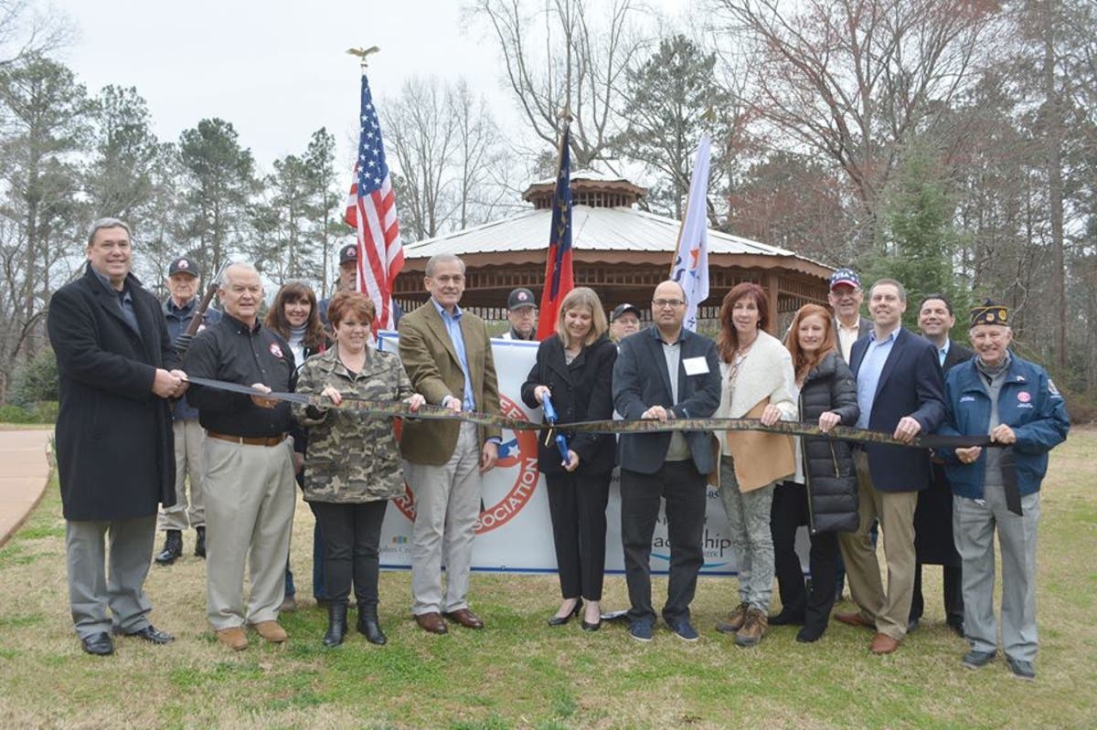 Johns Creek leaders helped organizers cut the ribbon signifying the start of fundraising efforts.