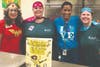 CCSD Executive Directors Julie Little and Charlette Green donned superhero gear to volunteer at Hasty ES Fine Arts.