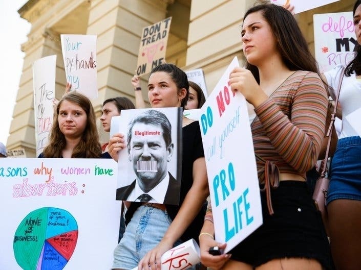 Women from Paideia High School protest against recently passed abortion bills in Atlanta last month.