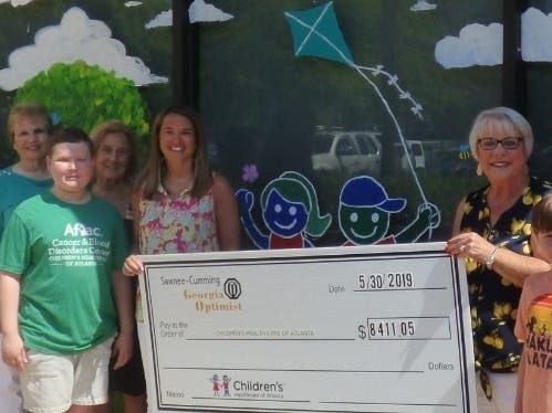 The Sawnee-Cumming Optimist Club contributed $8,411 to Children's Healthcare of Atlanta.