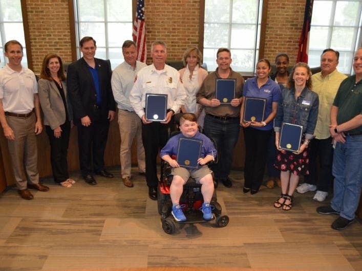 The Milton Council recognized the fire department and honored Muscular Dystrophy families for a 12-year partnership.