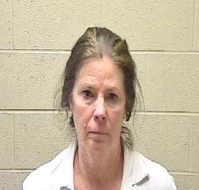 Police said Melody Farris, 59, of Alpharetta, was arrested for murder, aggravated assault and concealing a death.