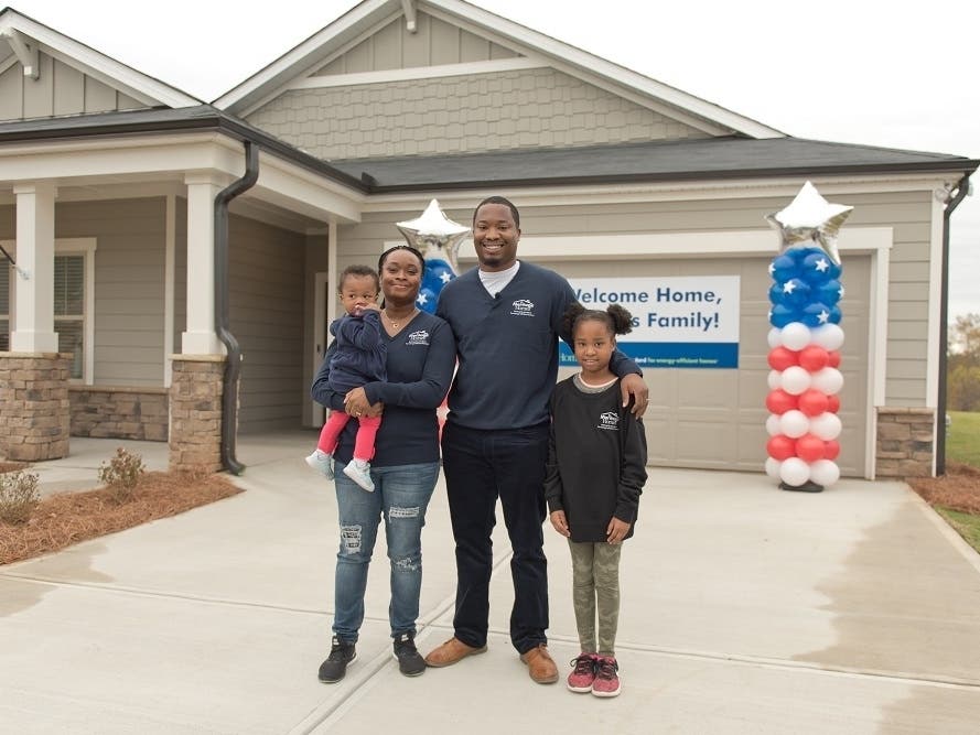 U.S. Marine veterans Shandrika and Juval Shreves, along with their two children, received the keys to a brand new 1,933- square-foot home in Canton.