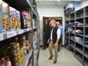 Superintendent Brian Hightower walks into the new food pantry opened by staff and partners at Oak Grove ES Fine Arts Academy.