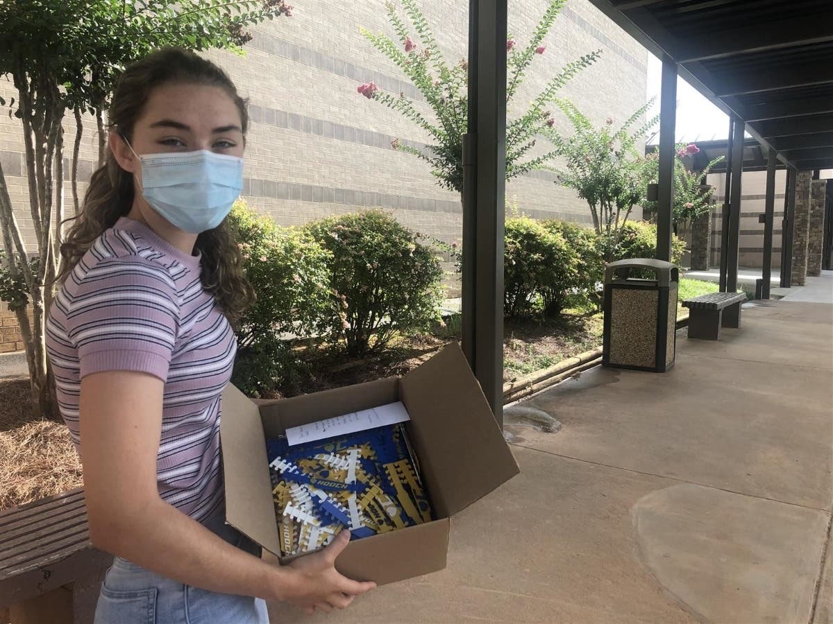 Chattahoochee High School student Julia Scott brought her "ear savers" to Chattahoochee High School for staff to use.