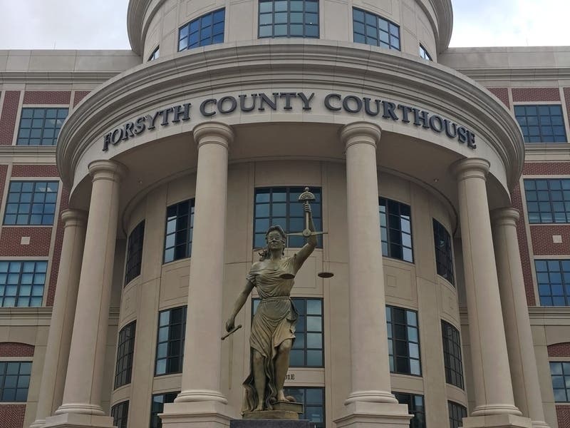 Forsyth County Sheriff's Office Chief Deputy Grady Sanford was fired Tuesday after the GBI arrested him on charges of distribution of child porn.