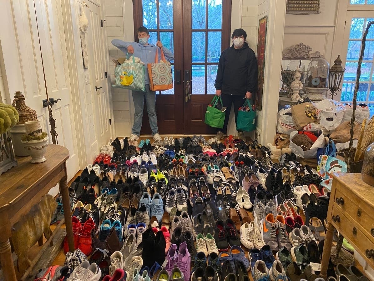Two Cambridge High School juniors are collecting shoes for those in need, in honor of their friend who died last year. 