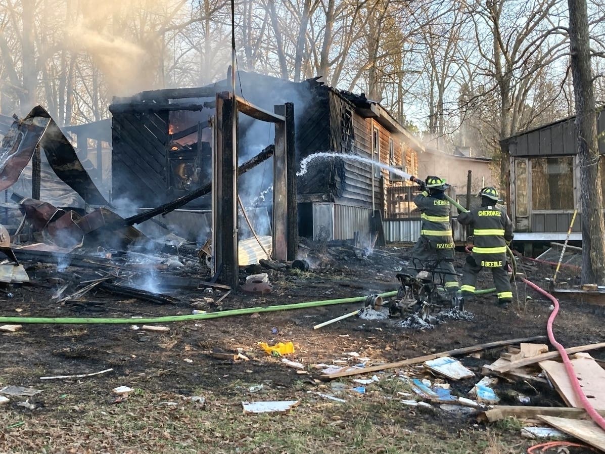 Cherokee County fire investigators said a 9-year-old and 11-year-old were playing with a lighter at the home off Darby Road in Waleska.