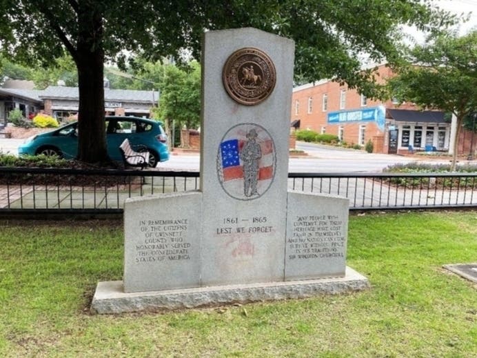 The Gwinnett County Board of Commissioners has agreed to relocate a Confederate monument out of sight until a court case determines its future.